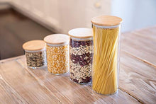 Load image into Gallery viewer, Glass Food Storage Containers with Lids by Sweetzer and Orange - Set of 4 Kitchen Canisters - Candy, Cookie, Rice and Spice Jars - Sugar or Flour Container - Big and Small Airtight Food Jar for Pantry
