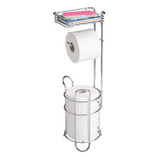 Load image into Gallery viewer, mDesign Freestanding Metal Wire Toilet Paper Roll Holder Stand and Dispenser with Storage Shelf for Cell, Mobile Phone - Bathroom Storage Organization - Holds 3 Mega Rolls - Chrome
